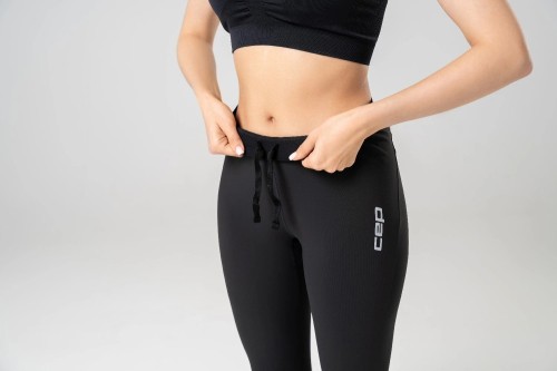 Утепленные беговые тайтсы CEP, женские фото 6